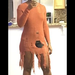 Distressed long sleeve shirt.